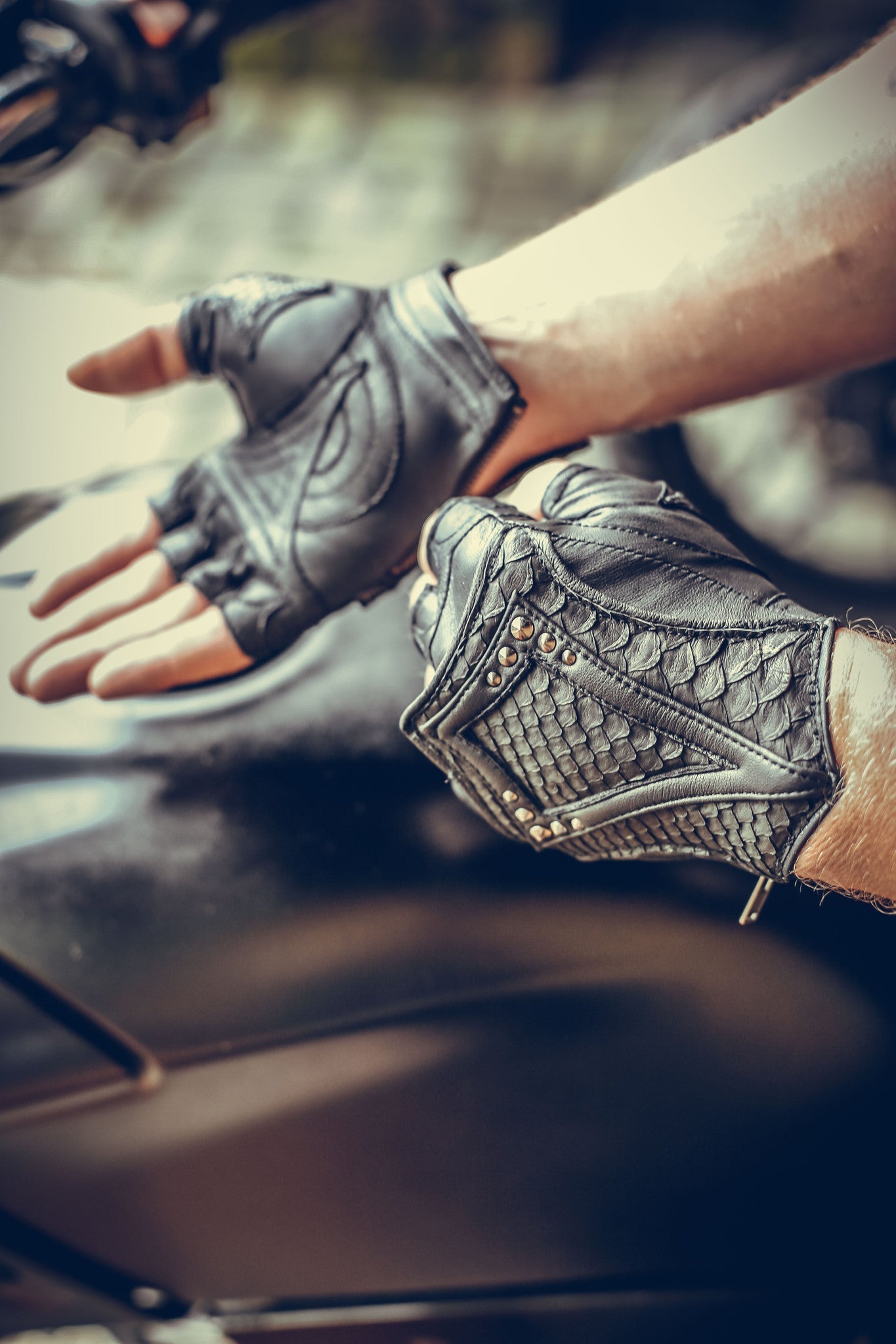 black leather DragonScale gloves on motorcycle- anahata designs fingerless leather python gloves perfect for burning man or cosplay
