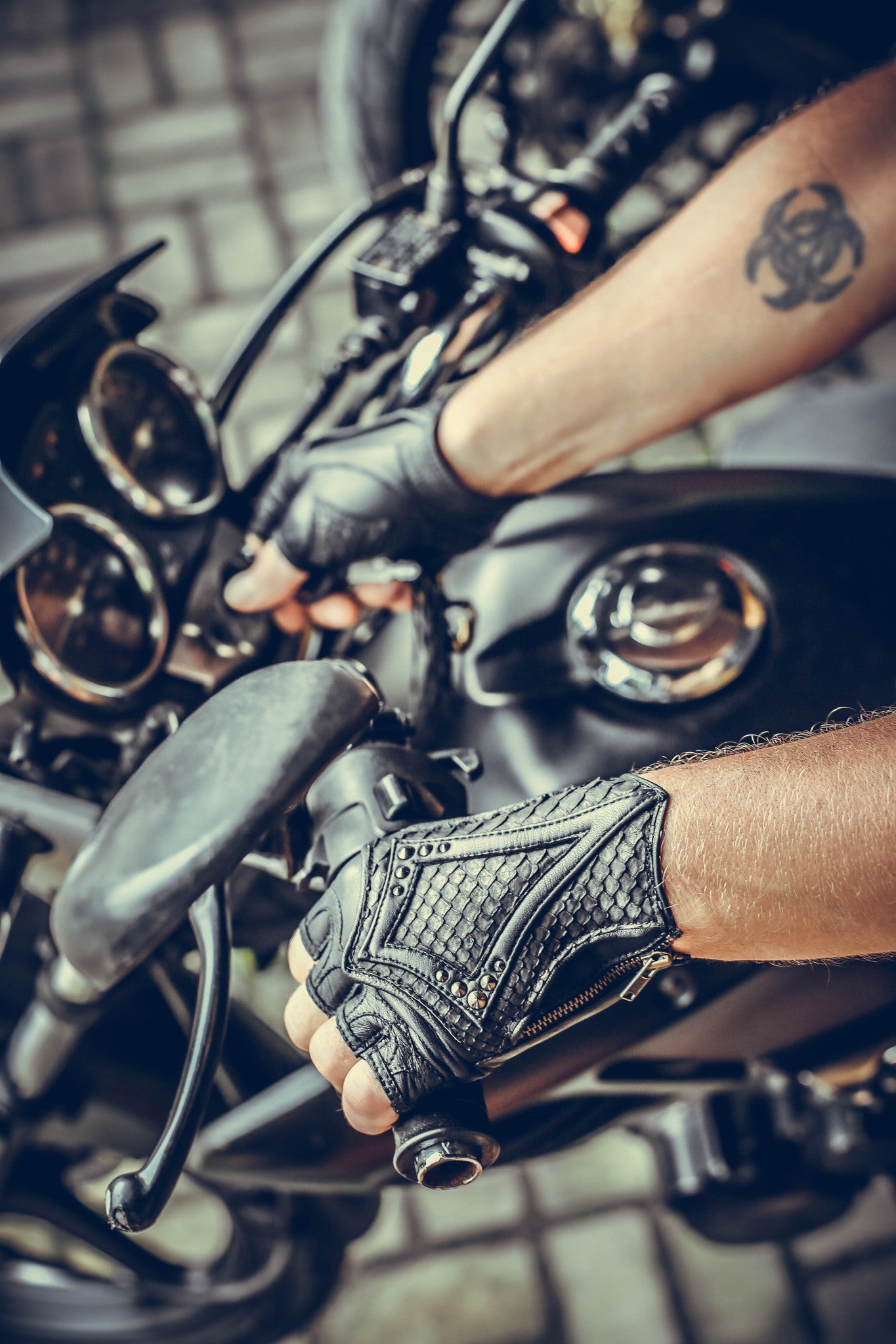 black leather DragonScale gloves on motorcycle- anahata designs fingerless leather python gloves perfect for burning man or cosplay